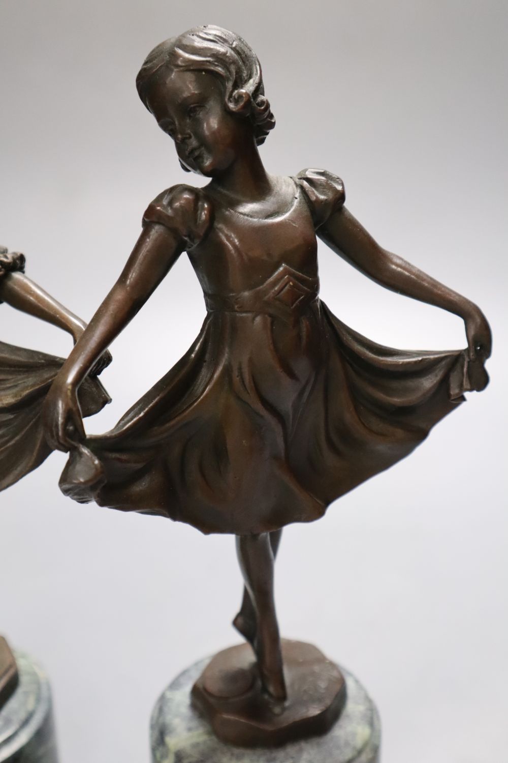 After Preiss - A pair of modern French bronzes of dancing girls, on marble plinths, 26cm high